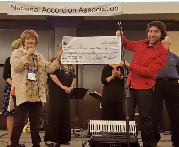 Cory Pesaturo and Laura Niland with MAS check