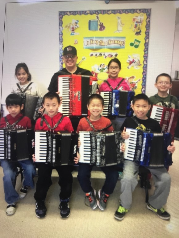 Queens Accordion students with Joe